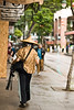 Street Scenes Hawaii : Interesting info on Photographers Rights found on the web (This is for infomation only, and is not legal advice LOL):
The Photographers Rights
http://www.krages.com/phoright.htm

Legal Rights of Photographers
http://www.kantor.com/useful/Legal-R...tographers.pdf

9 Keys to Avoiding Invasion of Privacy Suits
http://rcfp.org/photoguide/ninekeys.html


Interesting example taken from the above links:
An Example
A photographer goes to a local mall, camera in hand, without informing the mall that he would be there.
He shoots some people walking around and some of the store displays. This is legal. He shoots some of the kids
playing in the little playground the mall has set up. This is legal.
In a drugstore, a woman gets a prescription and stands in a corner to read the instructions. The photographer uses
a zoom lens and gets a nice, tight shot of her reading the paperwork, in which you can see that it’s a bottle of
Prozac. Taking this shot is illegal because the woman, standing in the corner, has an expectation of privacy.
While in the food court, a mall security guard spies the photographer and asks him to stop shooting. The
photographer refuses and continues taking pictures. Taking these pictures is legal.
Angry, the security guard orders the photographer to leave the premises. The photographer refuses. He is now
trespassing. He continues to take photos, including of the security guard. Taking these pictures is legal.
The guard then escorts the photographer to the mall offices, where he is asked to wait. While there, he walks
around a bit and takes photographs of people working in their offices doing company business. Taking these
pictures may not be legal as the people in those offices have an expectation of privacy.
The mall manager informs the photographer that he is banned from the premises and demands that he turn over
his film or digital media. The photographer refuses. The manager then demands that he not publish any of the
photos he took in the mall and has him escorted from the premises.
The photographer publishes many of the photos he took, despite the manager’s demand. This is legal. He
publishes photos of the kids playing in the playground, although he didn’t ask their parents’ permission. This is
legal as they had no expectation of privacy.
He publishes the photograph of the woman examining her Prozac prescription. The photographer risks a lawsuit
as this reveals private facts about the woman that have no news value and that a reasonable person would not
want revealed.
He publishes the photos of the mall office, and of the people working there — none show what they are working
on, or any private or embarrassing information. The risk of a lawsuit is minimal even though taking the photos
themselves may not have been.
He adds a caption to one of the office-worker photos, “Roger McMurty of the Lone Pine Mall works on his
résumé one Thursday afternoon.” The photographer risks a lawsuit as this portrays McMurty in a false light —
implying that he is looking for a job and doing personal work on company time.
Another of the office-worker photos shows a woman facing front and pointing to a chart. The photographer sells
this to a stock-photo house which will then resell it. This may not be legal as it may misappropriate the woman’s
image.
The next day, the photographer returns to the mall despite being banned and takes more general pictures. Being
there is illegal; he’s trespassing. But taking the photographs is not, as long as he is not violating anyone’s
privacy. He is caught by security and escorted from the building. He publishes the photos he took. This is legal.